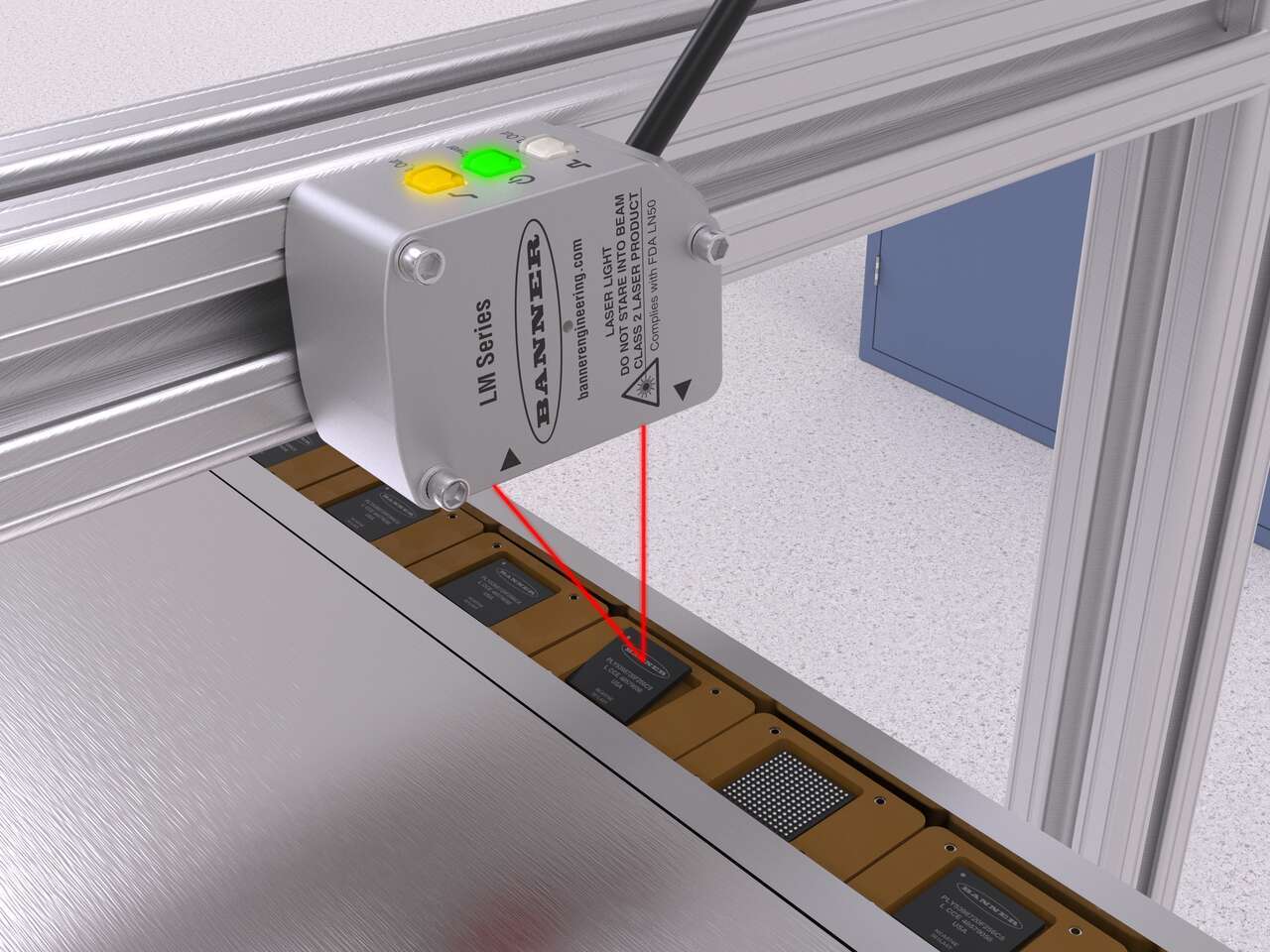 LM sensor inspects IC chips seated in nests 