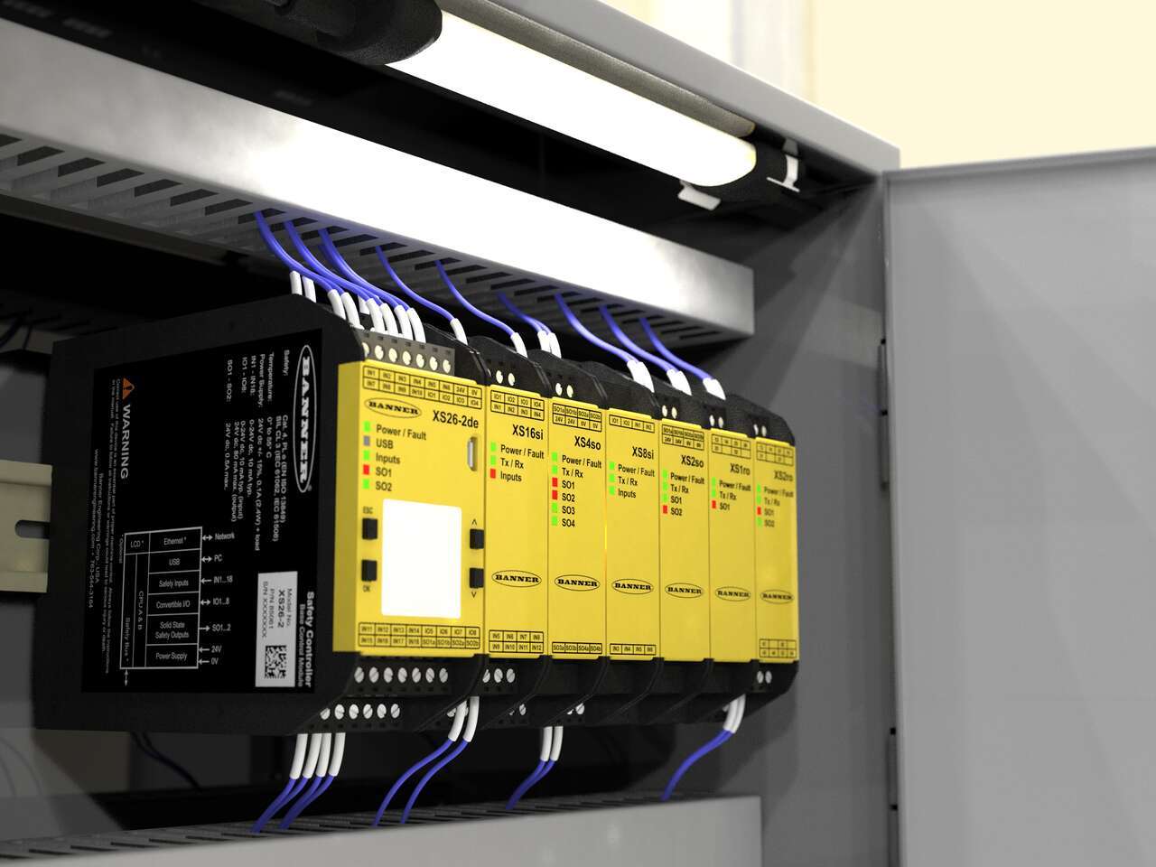 XS26-2 safety controller and WLS15C WLS15 led light illuminates a safety control cabinet
